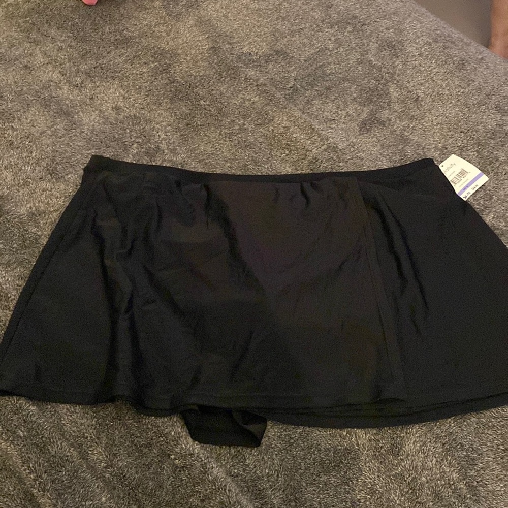 Brand new, never used or warn w/tag &hygiene liner intact.Swimsuit skirt bottom